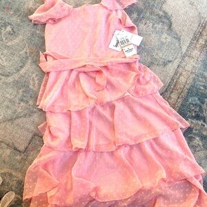 Size 12. Light pink girls dress. New with tags